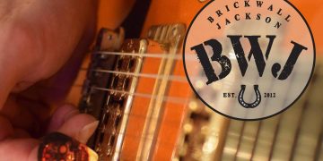 “Big Orange Guitar” by Brickwall Jackson